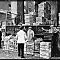 Members of the Barker family, farmers of Laleham on Thames, selling their produce at Covent Garden market.