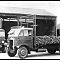 An Albion lorry loaded with root vegetables belonging to W.R. Bennett of Bedfont.