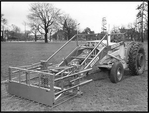 An attachment designed and made by Gibbs for Bushells of Yateley to push mushroom compost onto the heap.